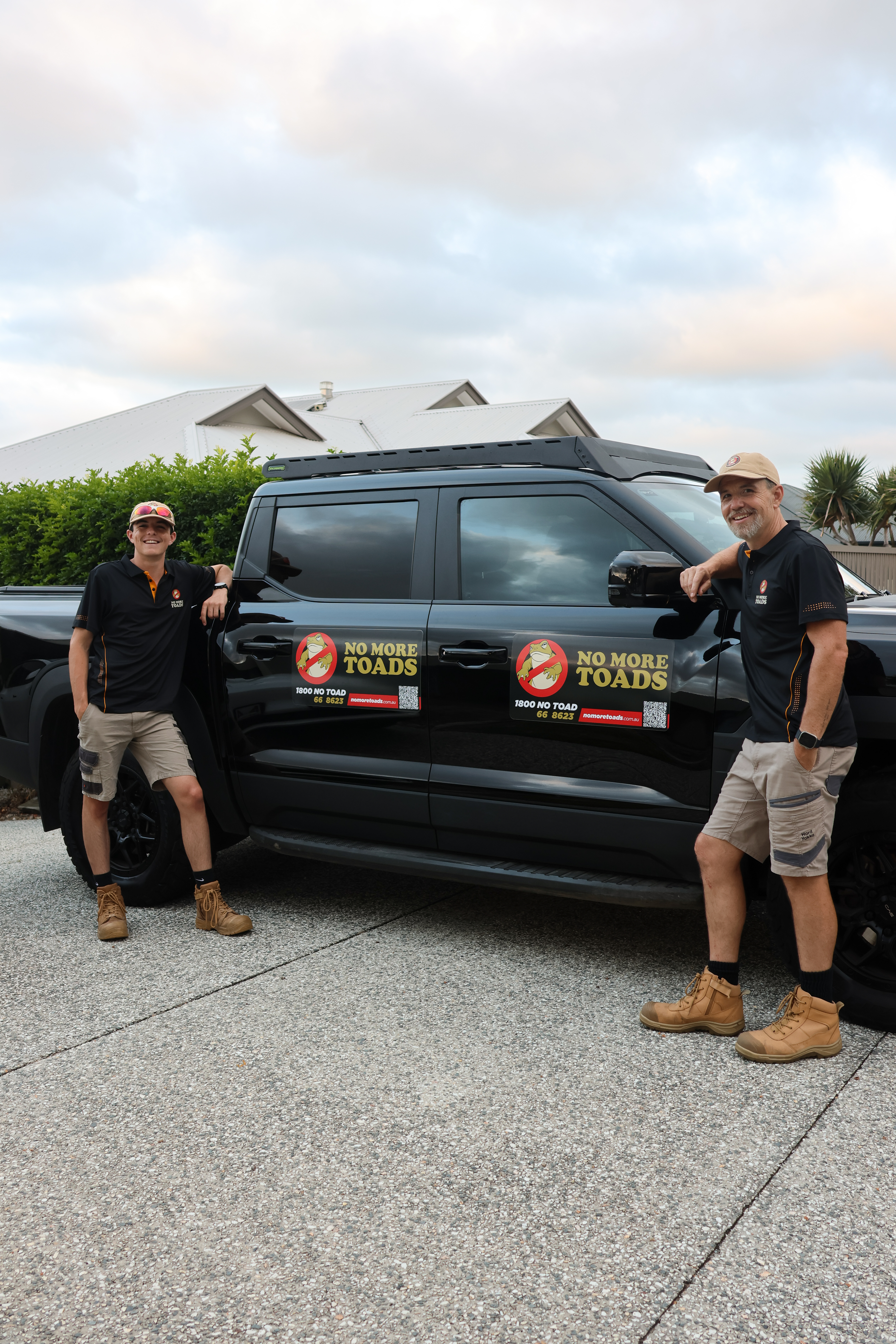 Oscar and Matt with the No More Toads branded vehicle